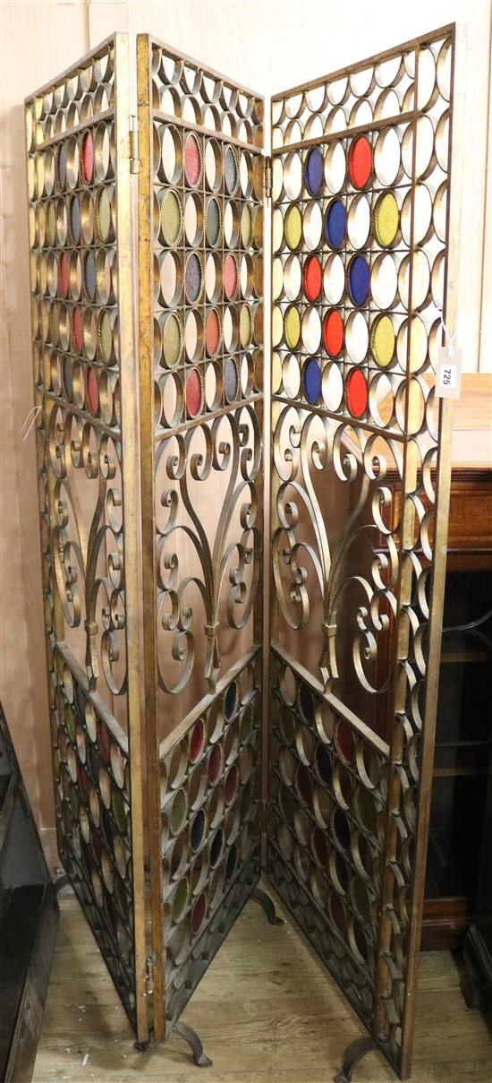 A gilt painted metal and glass three fold screen overall W.191cm approx.